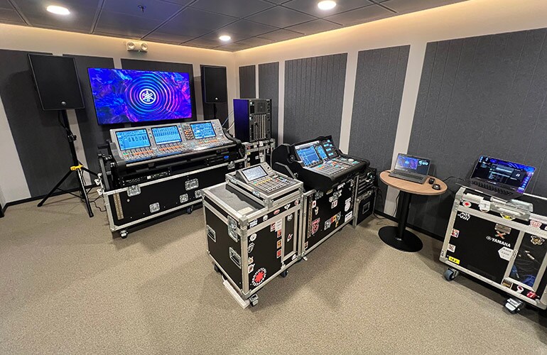 Manila training facility with classroom seating, display screen, and audio training equipment.