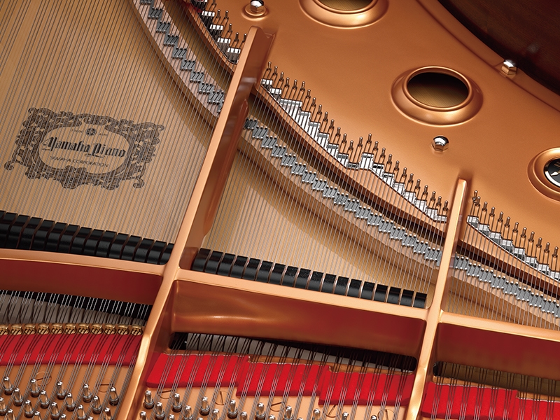 A photo of a Yamaha concert grand piano, CFX