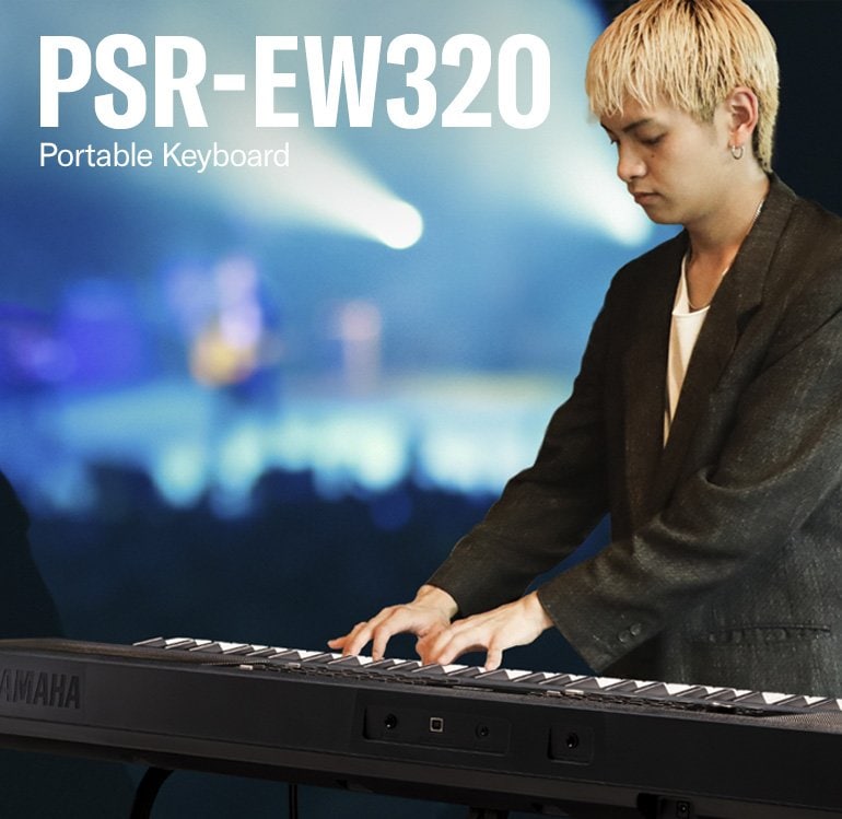 The man is playing the PSR-EW320.