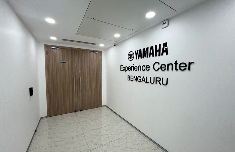 Bengaluru training facility entrance with Yamaha signage.
